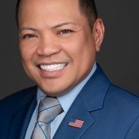 Official portrait of Ronald Quince